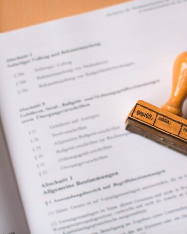 brown wooden hand tool on white printer paper